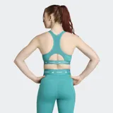 Top deportivo Adidas TECHFIT color verde con logo blanco y banda inferior con la inscripción "TECHFIT".