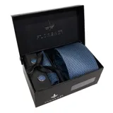 Set de corbata, pañuelo de bolsillo y gemelos color azul con diseño de micro puntos.