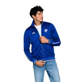 Campera deportiva Umbro Monogram CNdeF color azul, con cierre frontal, cuello alto y franjas decorativas en mangas y puños. Incluye el logo de Umbro en el pecho izquierdo y el escudo del Club Nacional de Football en el derecho.