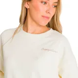 Buzo color crema de corte holgado, con cuello redondo y logo de la marca bordado en el pecho.