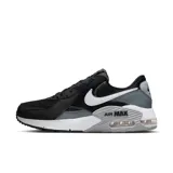 Zapatillas deportivas de corte bajo, color negro con detalles en gris y diseño icónico de Nike.