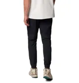 Pantalón de jogging negro con logo de Columbia en blanco en el muslo.