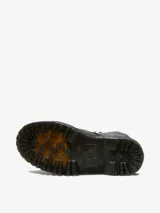 Botas Dr. Martens modelo Sinclair, color negro con textura granulada, plataforma Quad, cierre frontal con cremallera y cordones.