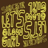 Pañuelo tipo pareo color marrón con estampado de frases en amarillo, diseñado en colaboración SOKO x CAPER.