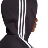 Campera Adidas Essentials French Terry de hombre, color negro con capucha y cierre completo. Diseño con tres rayas blancas en las mangas y logo Adidas bordado en el pecho.