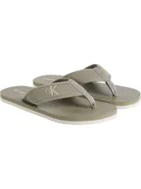 Ojotas Calvin Klein Jeans color verde oliva con base texturizada y tiras de lona con logo CK.