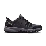 Championes Skechers Slip-ins Dynamite AT color negro y gris, con capellada de cuero y material textil, cordones elásticos, plantilla Skechers Air-Cooled Memory Foam y suela flexible con alta tracción. Diseñados con sistema Heel Pillow.