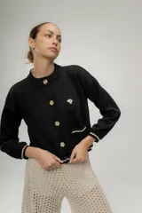 Cardigan de algodón negro con detalles en contraste y bordado con contorno de lurex.