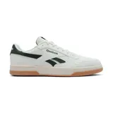 Championes Reebok Classics Prime Set blancos con detalles en verde oscuro. Presentan el logo de Reebok en el lateral y suela de goma color caramelo.