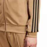 Campera Adidas Adicolor Classics Beckenbauer color beige con cierre frontal, cuello alto y tres rayas negras en las mangas.