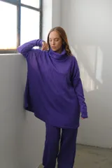 Pantalón de jogging verde oliva de tejido de punto con textura en forma de rombos.