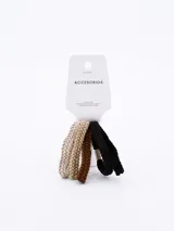 Pack de cinco coleros de pelo tejidos en crochet, en tonos beige, marrón y negro.