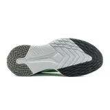 Championes Fila Racer Comet para hombre, color verde claro con detalles en negro y gris. Zapatillas deportivas con capellada de malla transpirable y suela de goma con tecnología de amortiguación.