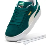 Championes Puma Suede XL de gamuza color verde con detalles en blanco.
