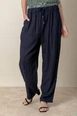 Pantalón italiano de lino azul marino, de corte amplio, con cintura elastizada y cordón ajustable.