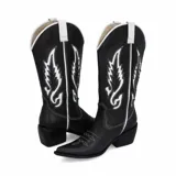 Botas texanas negras de cuero con bordados blancos y taco bajo.