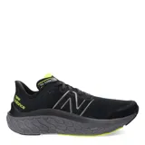 Championes de running New Balance Fresh Foam X Kaiha Road, color negro con detalles en amarillo lima y logo plateado.