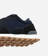 Championes de hombre marca Viko, estilo jogging, color azul marino y negro, con cordones y suela de goma. Confeccionados en material sintético con textura y recortes.