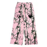 Pantalón rosa con estampado de ramas en negro, tiro alto y corte recto.