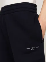 Pantalón de jogging azul marino, de corte cónico, con cintura elástica y logo bordado en la cadera.