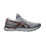 Championes de running Asics Gel Nimbus 24, color gris con detalles en negro y naranja.