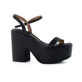 Sandalias negras de plataforma con taco bloque y tira delgada en el empeine y tobillo.