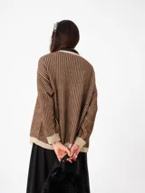 Cardigan tejido extra calentito con manga globo y cuerpo rayado que incorpora hilo de lurex.
