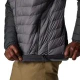 Campera puffer Columbia Powder Lite II, color verde oliva y gris claro, con capucha ajustable, cierre frontal, bolsillos laterales con cierre y logo de la marca bordado en el pecho.
