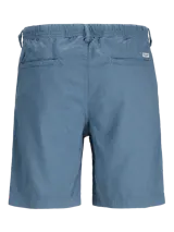 Short chino de lino color celeste, de corte relajado, cintura media y ajuste cómodo. Cuenta con cintura elástica con cordón ajustable, bolsillos frontales y traseros funcionales.