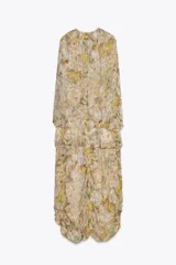 Vestido largo de viscosa con estampado floral, escote en pico, manga tipo capa con aberturas y bajo asimétrico.