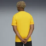 Camiseta de fútbol Puma del Club Atlético Peñarol, color amarillo con diseño geométrico en relieve. Presenta cuello redondo, logo de Puma bordado en el pecho y escudo del club.