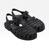 Sandalias Melissa modelo Possession, color negro, con diseño de tiras entrelazadas y hebilla lateral ajustable.