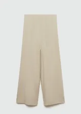 Pantalón culotte color beige de lino y viscosa, con cintura elástica y corte ancho.