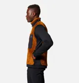 Chaleco de hombre color marrón con paneles laterales negros, cierre frontal y bolsillos con cremallera en el pecho y laterales.