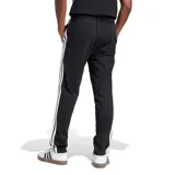 Pantalón deportivo Adidas negro con tres rayas blancas a los costados y logo blanco en el muslo.