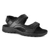 Sandalias marrones de cuero con tiras ajustables con velcro y suela de goma.