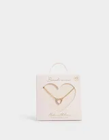 Cadena dorada con dije de corazón con piedras de zirconia rosas y blancas.