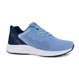 Championes deportivos American Sport Fluke, color celeste con detalles en azul marino y verde lima. Capellada de malla transpirable, ajuste con cordones y suela blanca con detalles en negro.