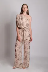 Pantalón de tiro alto con cinturilla elástica y cordones ajustables, con estampado floral y pierna ancha.