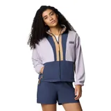 Campera Columbia de microfibra aterciopelada, con cierre frontal completo, bolsillos laterales con cremallera, ribete elástico en puños y dobladillo, y detalle de nailon en el pecho.