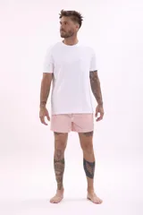 Short de baño color rosa pálido, de corte corto y tiro medio, con cordón de ajuste en la cintura.