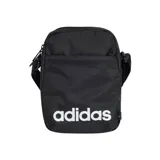 Morral compacto tipo bandolera de color negro, con el logo de Adidas en blanco en la parte frontal. Posee un compartimento principal con cierre y un bolsillo frontal con cierre. Incluye correa ajustable para llevar al hombro.