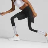 Calza deportiva Puma Run Favorite, larga, color negro con detalles en gris y blanco. Confeccionada con tecnología DryCell para control de la humedad y paneles de malla para mayor ventilación.