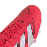 Championes de fútbol Adidas Predator Club FG/MG, color rojo con detalles en plateado. Empeine sintético con textura Strikeprint y suela versátil para césped natural seco y césped artificial.