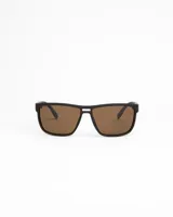 Anteojos de sol negros con lentes marrones polarizados y protección UV.