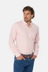 Camisa azul marino de manga larga con bolsillo en el pecho, confeccionada en algodón.