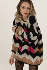 Sweater tejido a mano con lana merino, multicolor con patrón de zigzag en blanco, negro, rojo y beige.