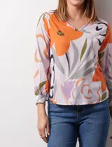 Blusa azul marino de gasa con escote en V y mangas largas con puño. Marca Sioni.
