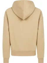 Buzo color beige de corte holgado, con capucha y logo de Calvin Klein bordado en el pecho.