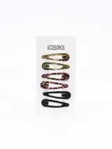 Pack de seis hebillas para el pelo tipo clip, con diseños variados: dos doradas con textura, dos con estampado de leopardo y dos negras lisas.